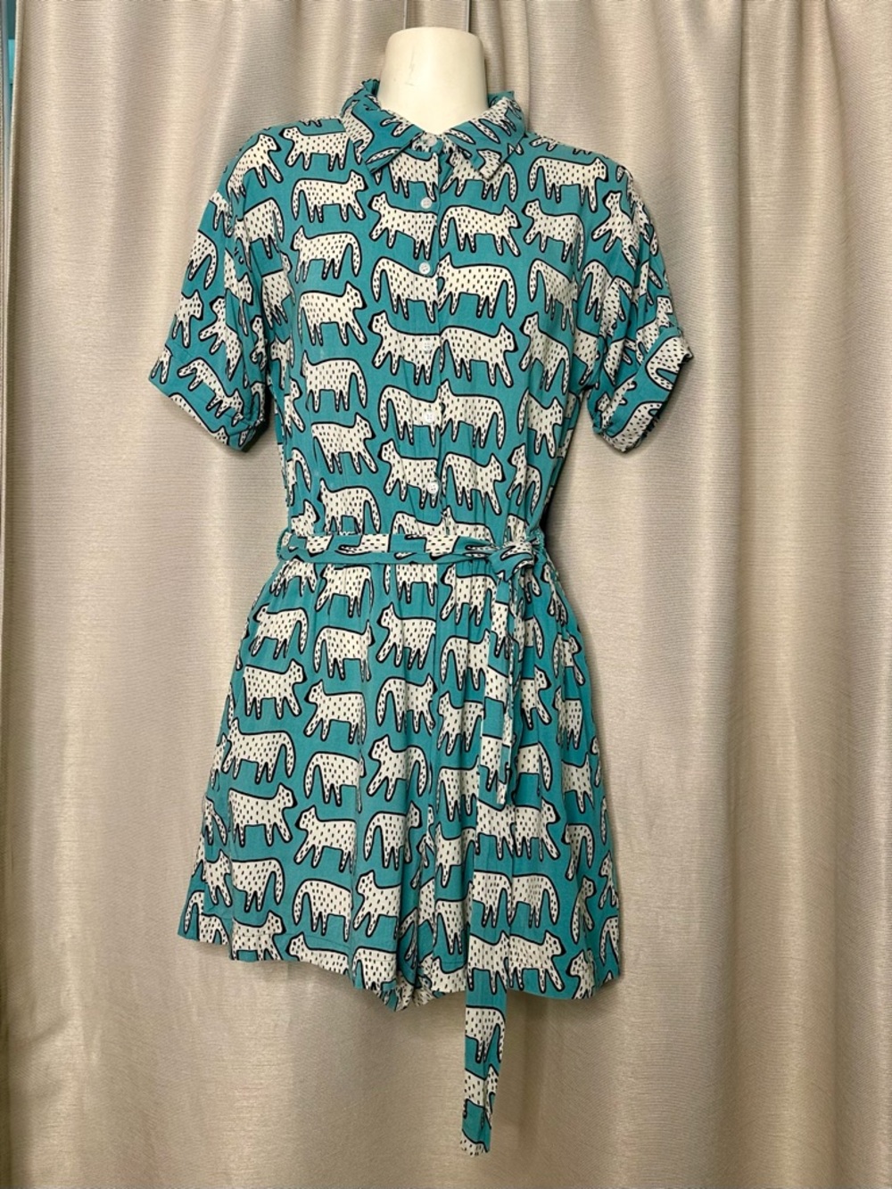 Teal “Cheetah Print” Short Sleeve Romper